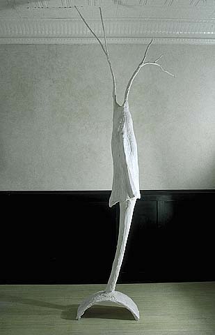 large transfigurative sculpture evoking daphne myth of woman girl transformed into tree
