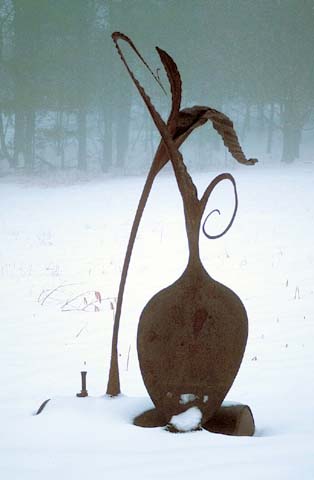 large outdoor hammered steel sculpture it is an organic transmutational representation of the subconscious of a sailor suffering from surreal delusions caused by fatigue cold and hunger