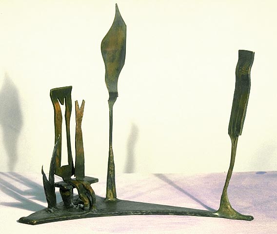 small scale figurative sculpture in hammered bronze