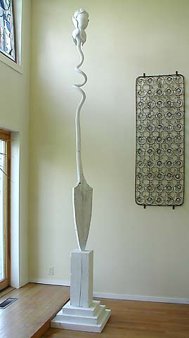 a giant carved rose crowns this large sculpture perfect piece for restaurant or hotel lobby